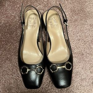 New Naturalizer sandals with gold design in front of sandal.